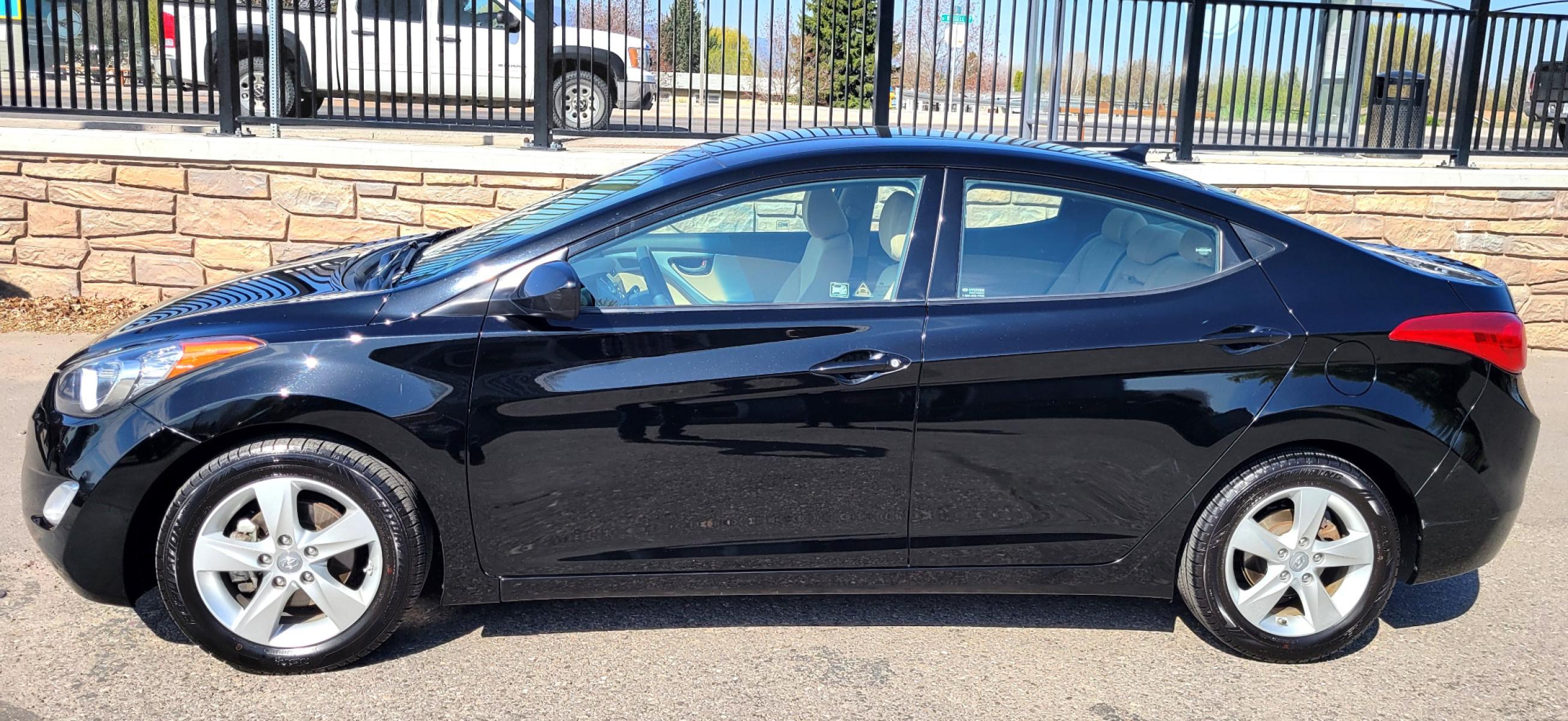 2013 Black /Tan Hyundai Elantra GLS (KMHDH4AE8DU) with an 1.8L I4 engine, 6 Speed Auto transmission, located at 450 N Russell, Missoula, MT, 59801, (406) 543-6600, 46.874496, -114.017433 - Low Mile Front Wheel Drive Sedan. One Owner. Excellent Fuel Economy. 1.8L I4 Engine. 6 Speed Automatic Transmission. AirConditioning. Power Windows and Locks. Bluetooth. - Photo #4